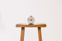 Clock and calendar showing effective time management strategies and scheduling